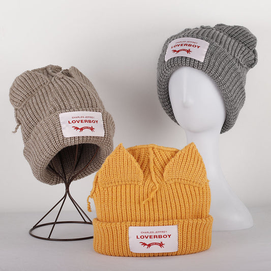 Double-layer thickened pig ear wool hat autumn and winter warm solid color knitted hat