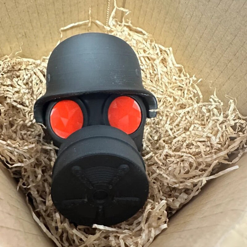 3D - printed trailer hitch cover with steel helmet and gas mask design. Protects the receiver tube from rusting.